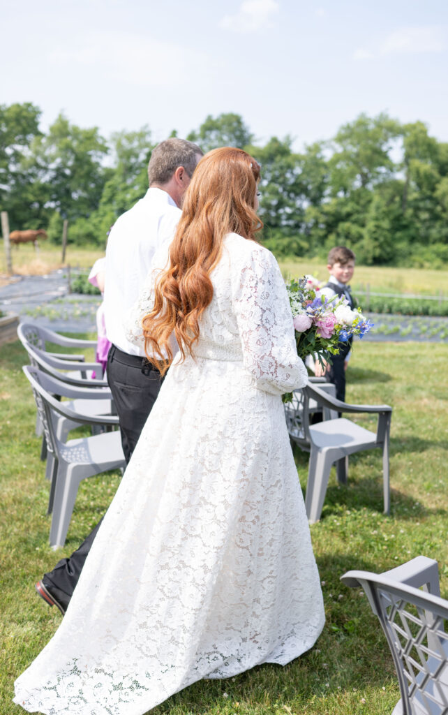 Father walking daughter down aisle 