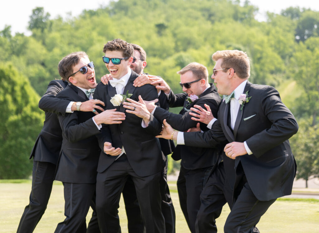 Groomsmen hyping up the groom