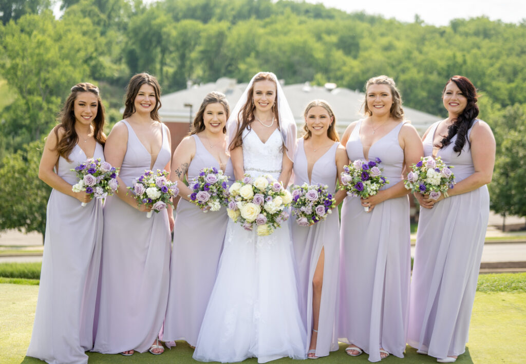 Bride with her girls in lavender dresses