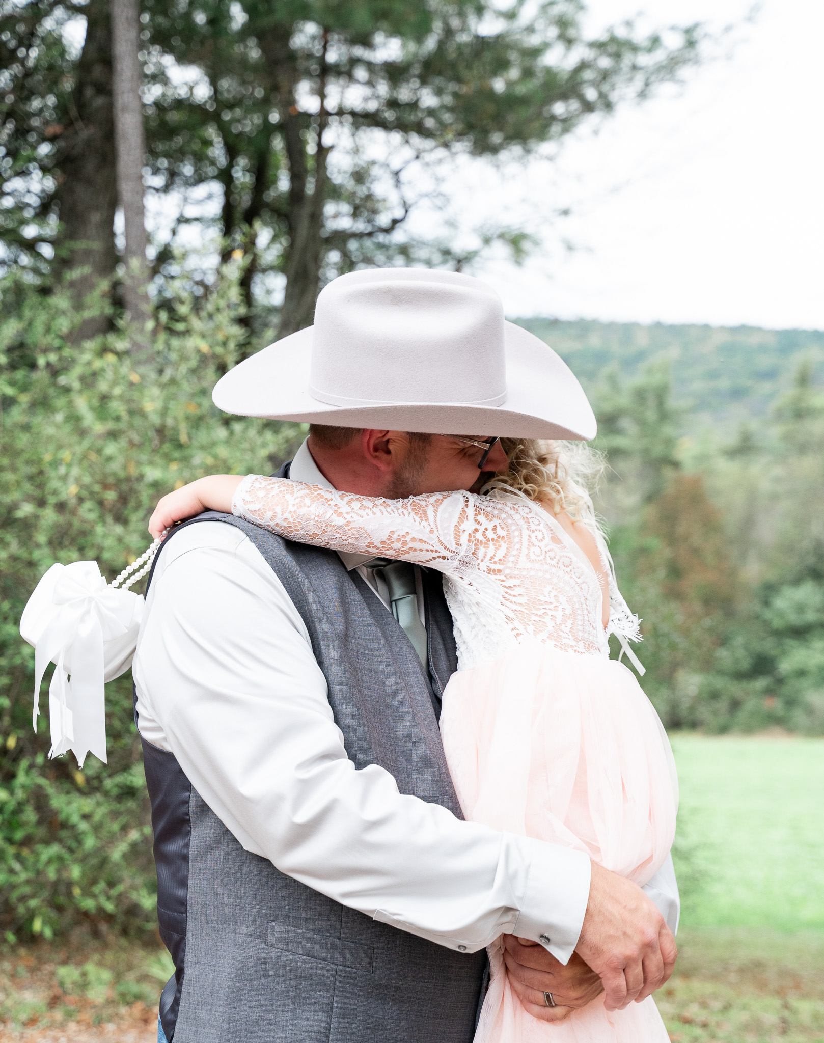 daddy daughter hug after wedding in Mifflinburg 