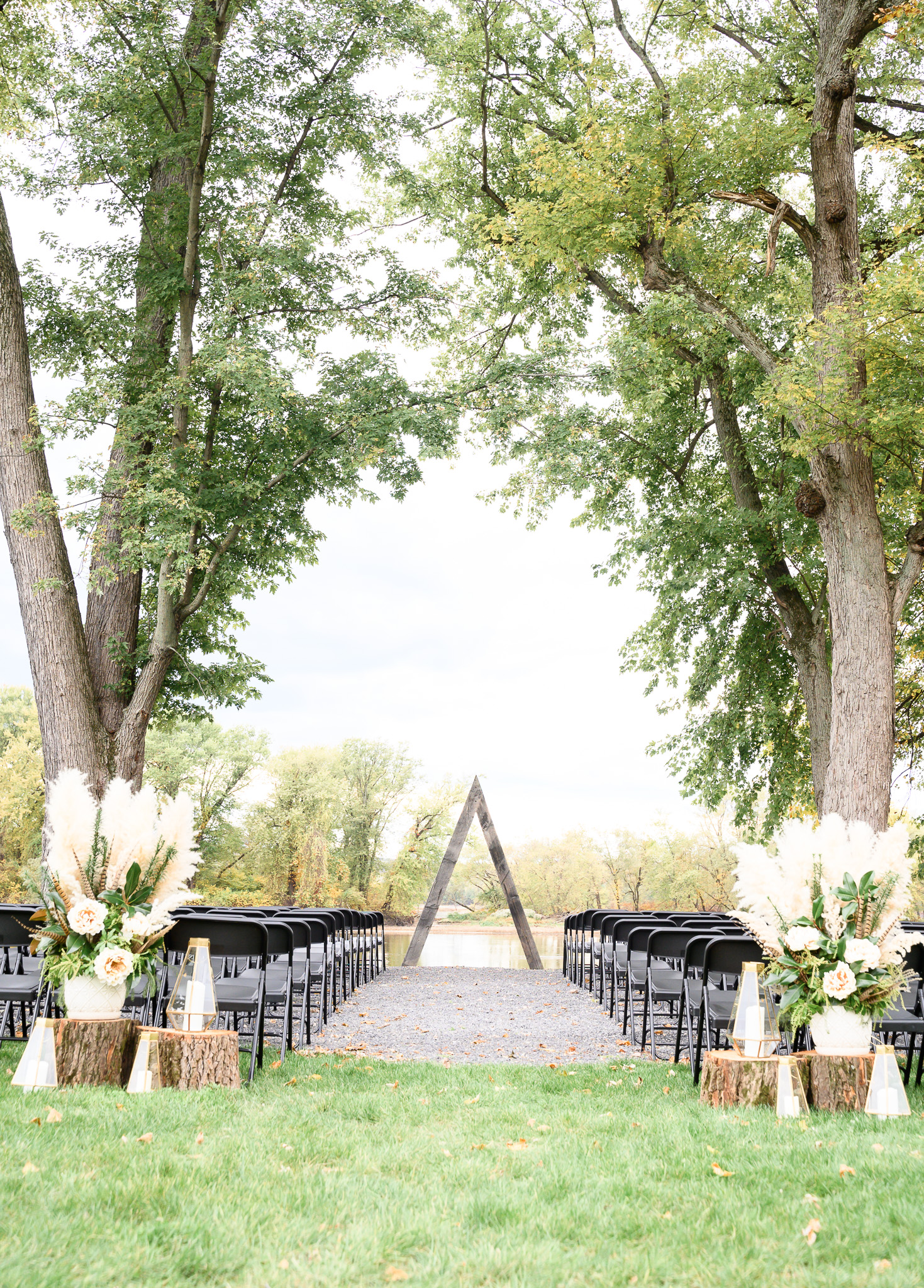 Romantic Riverside Ceremony setup for a Millersburg PA River Bend Venue Wedding